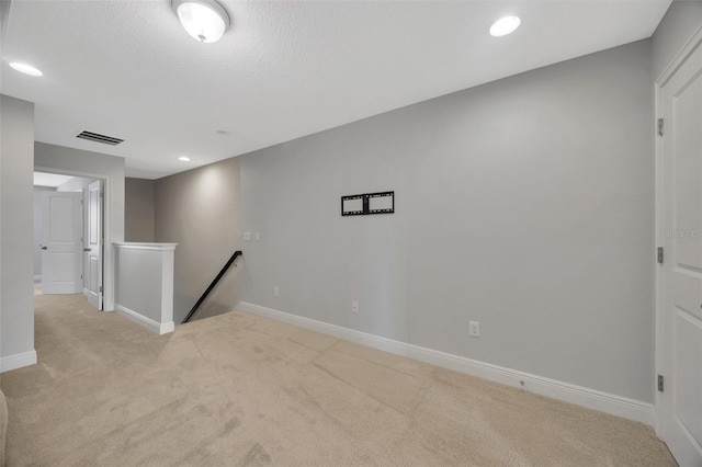 interior space featuring a textured ceiling