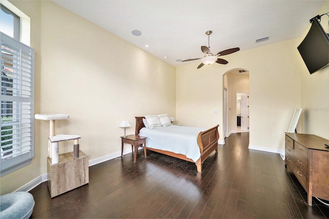 bedroom featuring ceiling fan and dark hardwood / wood-style floors