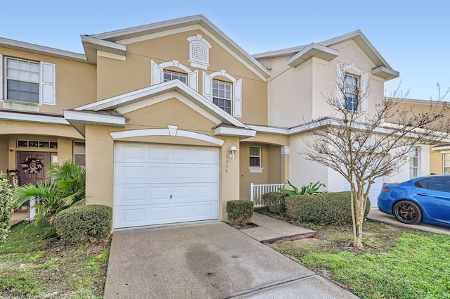 multi unit property featuring a garage