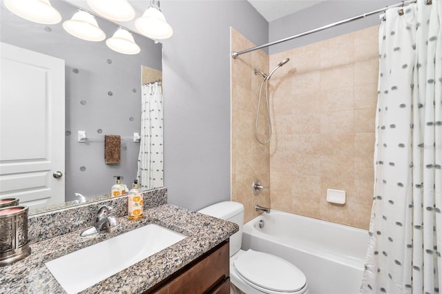 full bathroom with shower / tub combo with curtain, vanity, and toilet