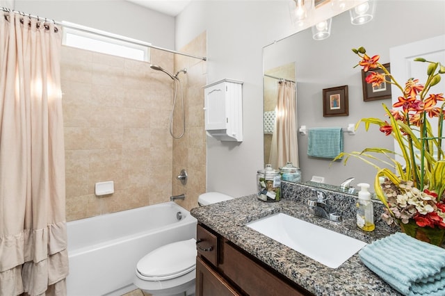 full bathroom featuring vanity, toilet, and shower / bath combo with shower curtain