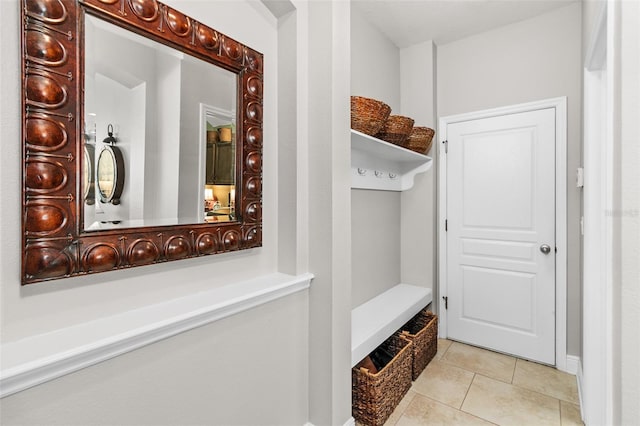 mudroom with light tile patterned floors