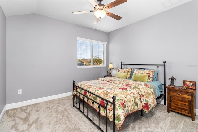 carpeted bedroom featuring ceiling fan and lofted ceiling