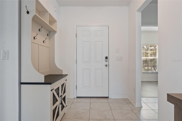 mudroom featuring light tile patterned floors