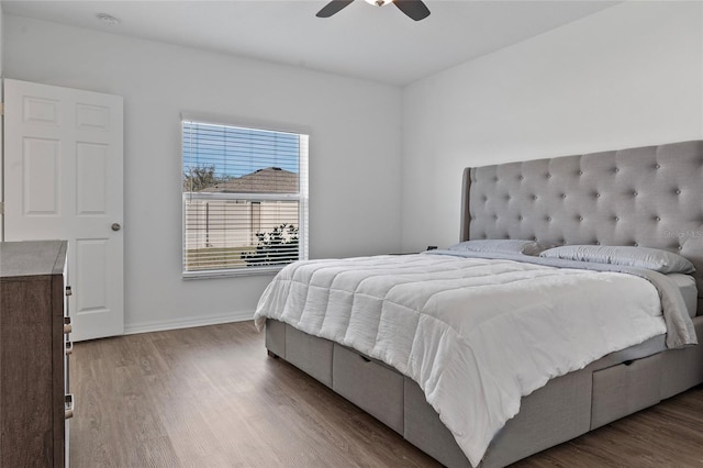 bedroom featuring ceiling fan and hardwood / wood-style floors