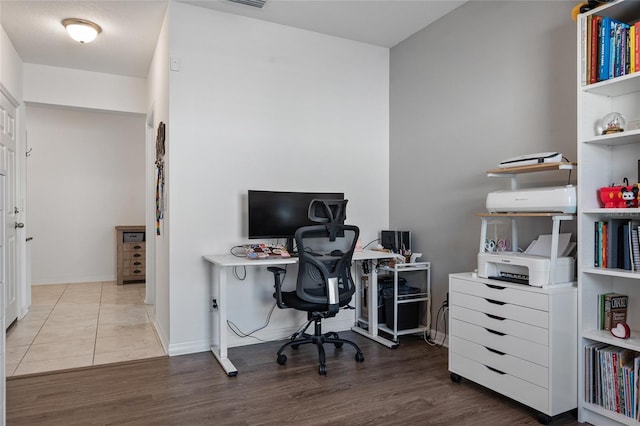 office space featuring hardwood / wood-style floors