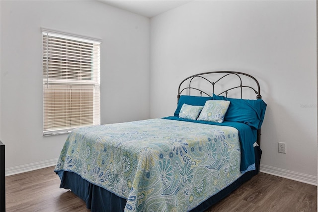 bedroom featuring hardwood / wood-style floors