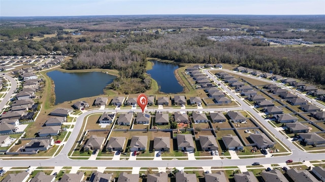 bird's eye view with a water view