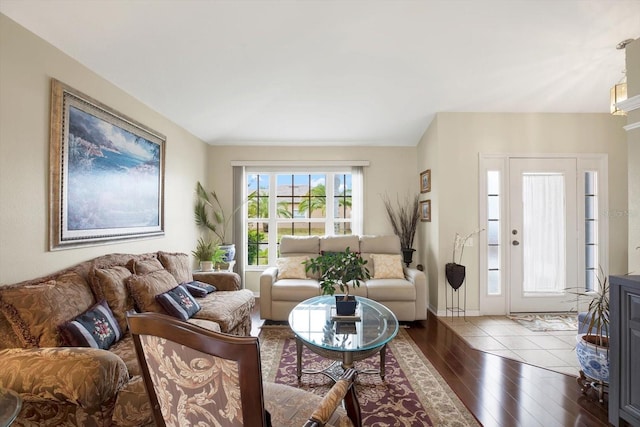 living room with dark hardwood / wood-style floors