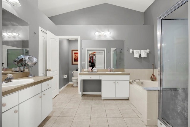 full bathroom with plus walk in shower, tile patterned floors, lofted ceiling, and toilet