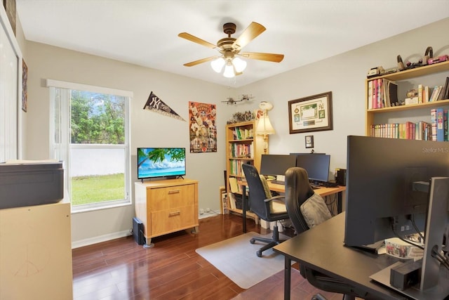 home office featuring ceiling fan and dark hardwood / wood-style flooring