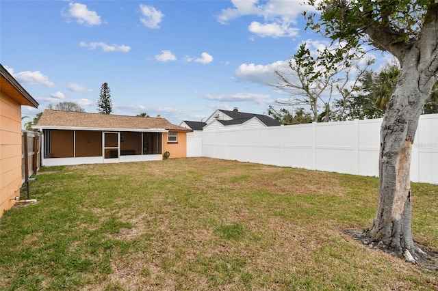 440 77th Ave, St Pete Beach, FL 33706 - fenced backyard featuring a sunroom