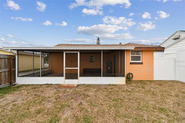 440 77th Ave, St Pete Beach, FL 33706 - back of property with a sunroom