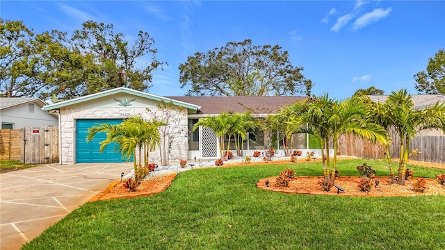 view of front facade featuring a garage and a front lawn