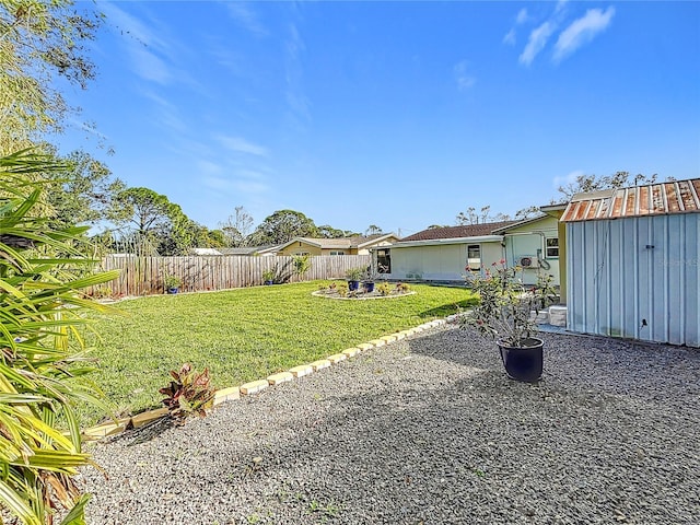 view of yard with a storage shed