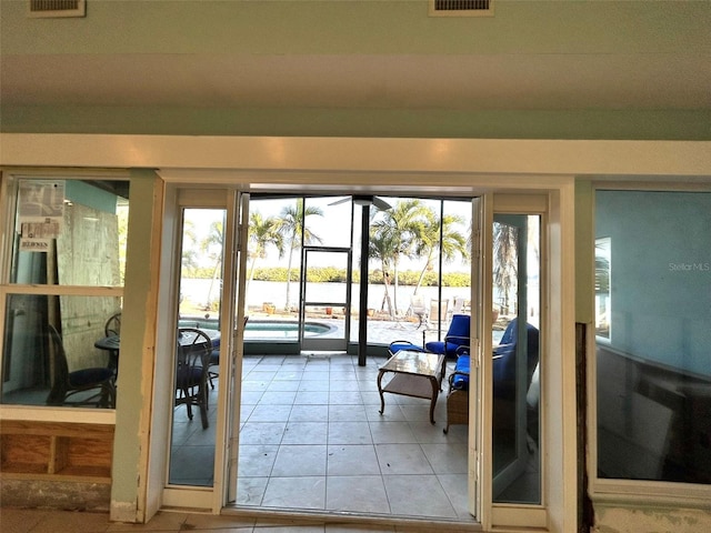 entryway featuring light tile patterned floors