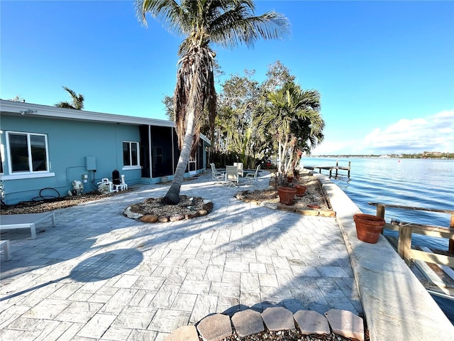 view of patio / terrace featuring a water view