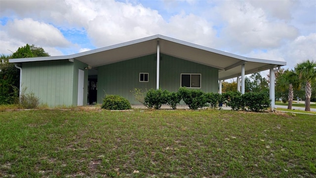 view of property exterior featuring a yard