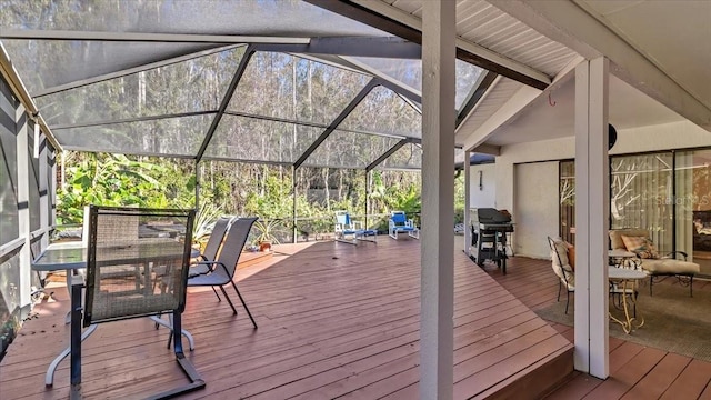 deck featuring area for grilling and a lanai