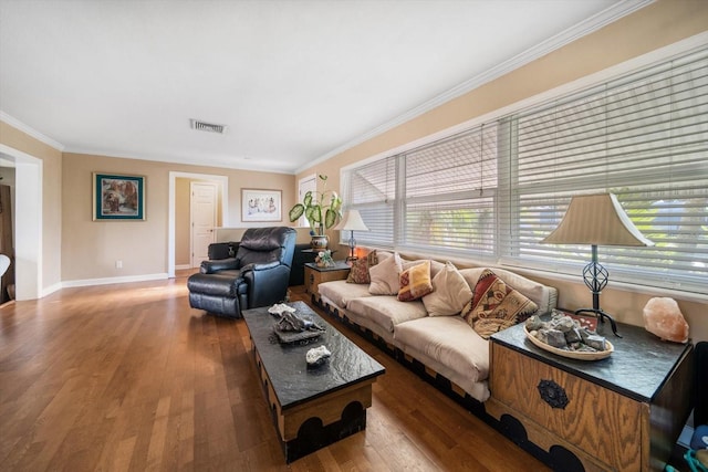 living room featuring crown molding and wood-type flooring