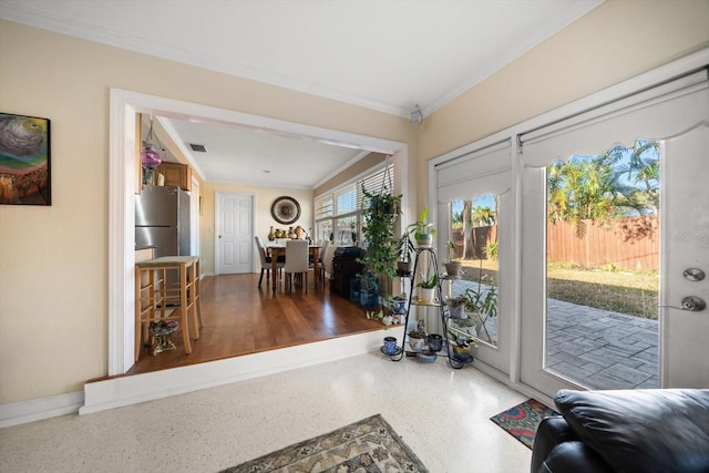 interior space with crown molding