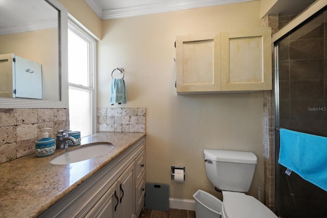 bathroom with backsplash, a shower with shower door, crown molding, and vanity