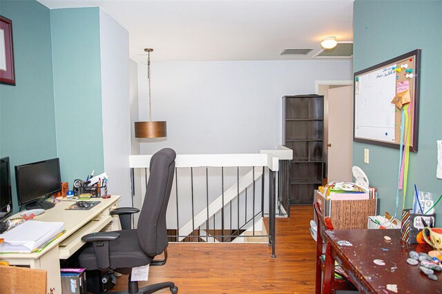 office featuring wood finished floors and visible vents