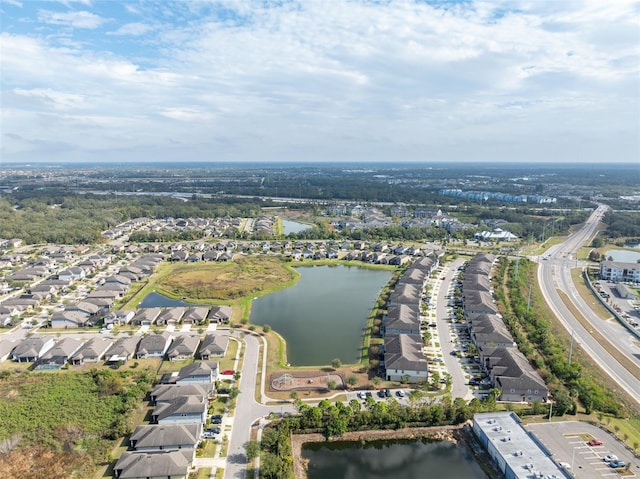 drone / aerial view with a water view