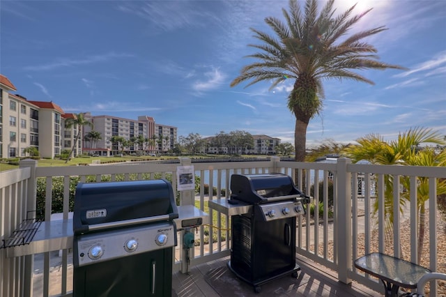 wooden terrace featuring area for grilling