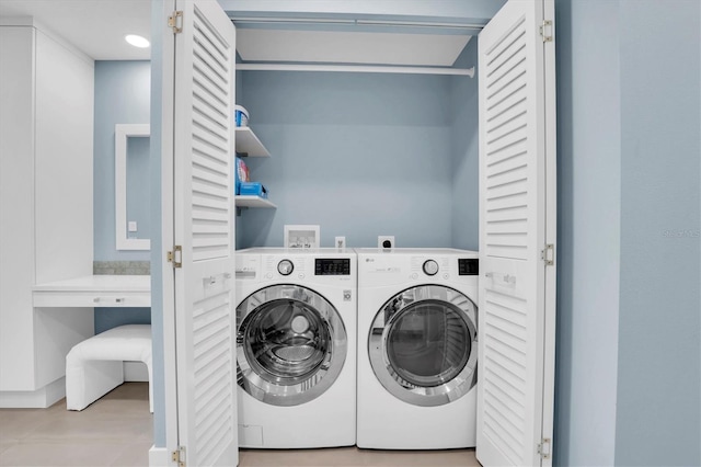 laundry room featuring washing machine and dryer