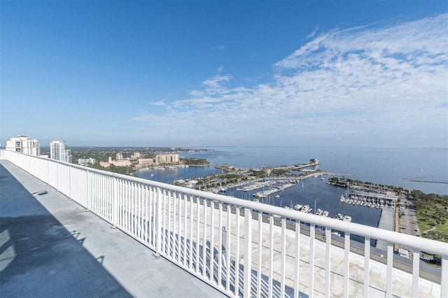 balcony featuring a water view