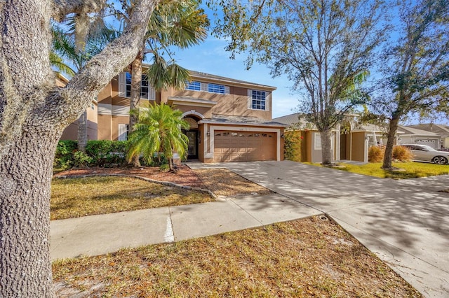 view of front of property with a garage