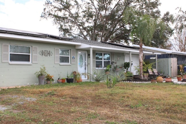 ranch-style house with a front yard