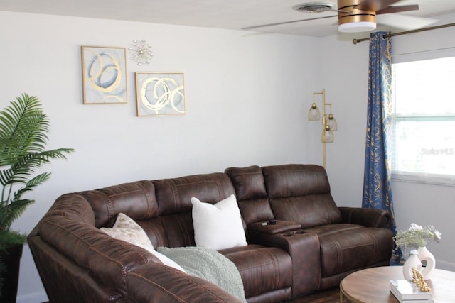 living room featuring ceiling fan