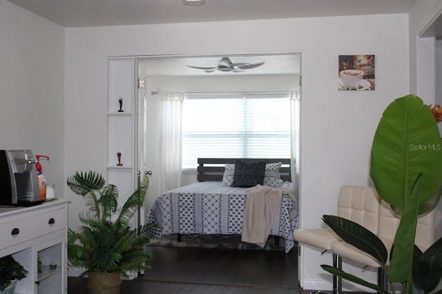 bedroom with hardwood / wood-style flooring