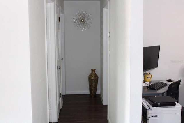 corridor with dark wood-type flooring