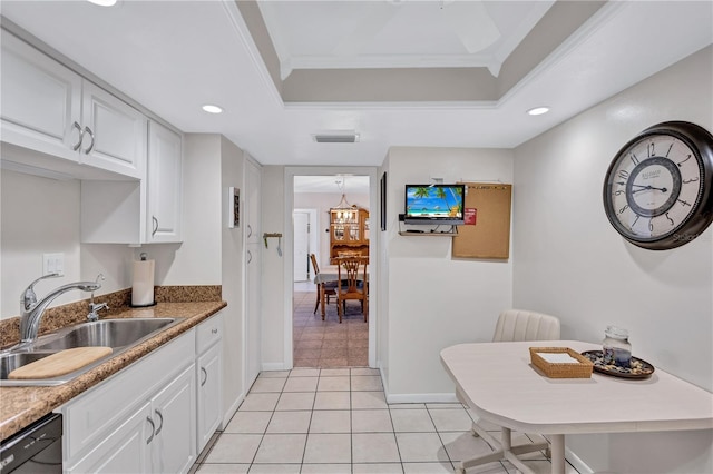 kitchen featuring white cabinetry, dishwasher, sink, crown molding, and light tile patterned floors