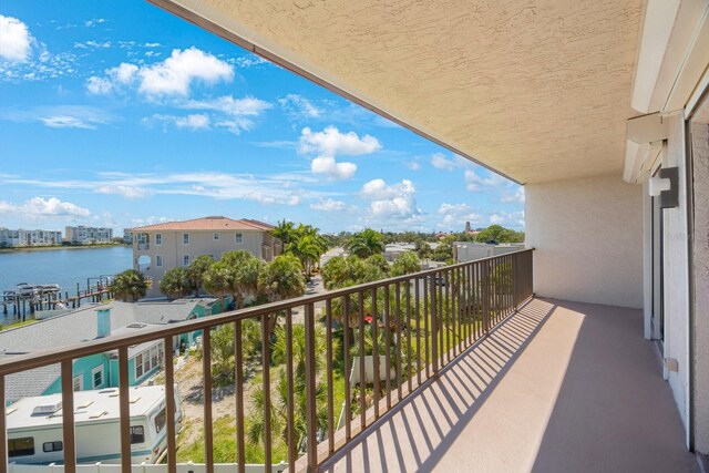 balcony featuring a water view