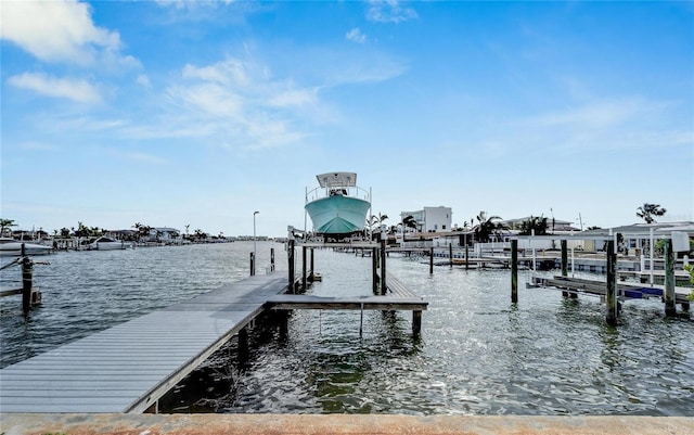 view of dock with a water view