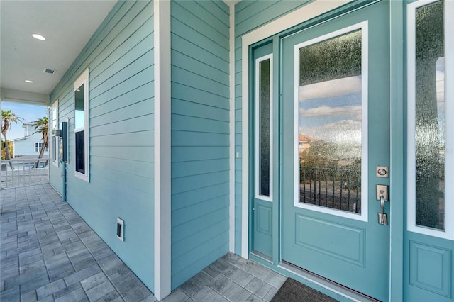 entrance to property with covered porch