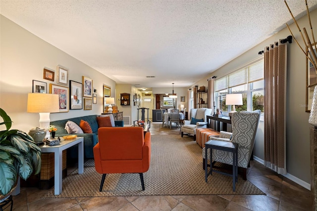 living room with a textured ceiling