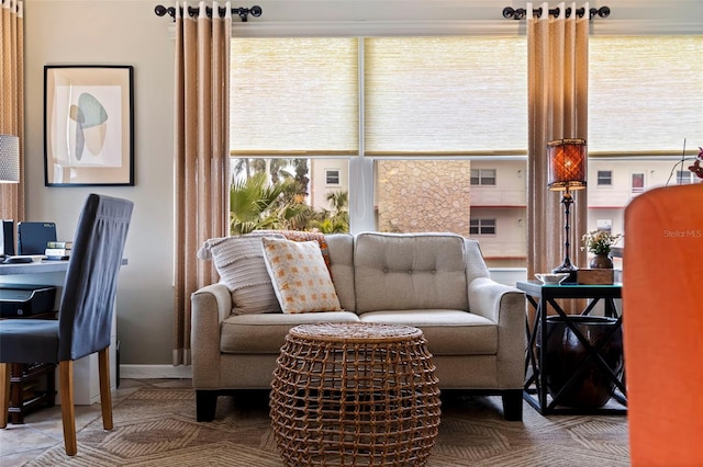 living room with tile patterned flooring