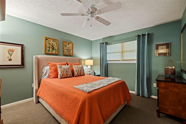 bedroom with ceiling fan, carpet, and a textured ceiling