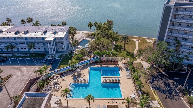 birds eye view of property featuring a water view