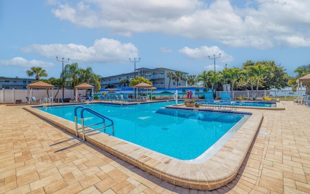 view of pool featuring a patio