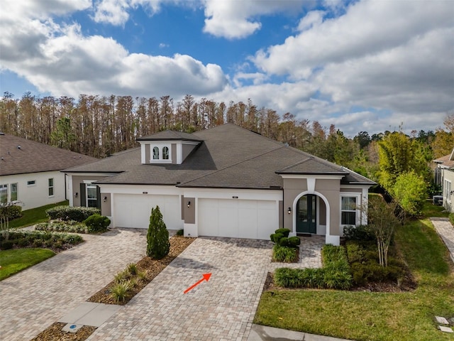 view of front of property featuring a garage