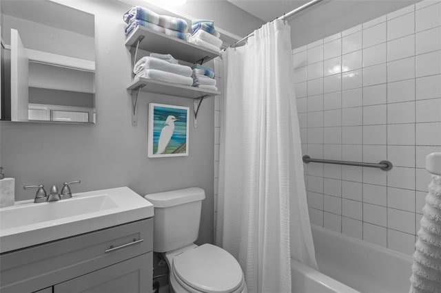 full bathroom with shower / tub combo, vanity, and toilet