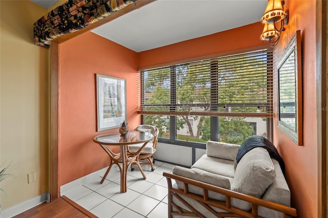 sunroom / solarium featuring plenty of natural light