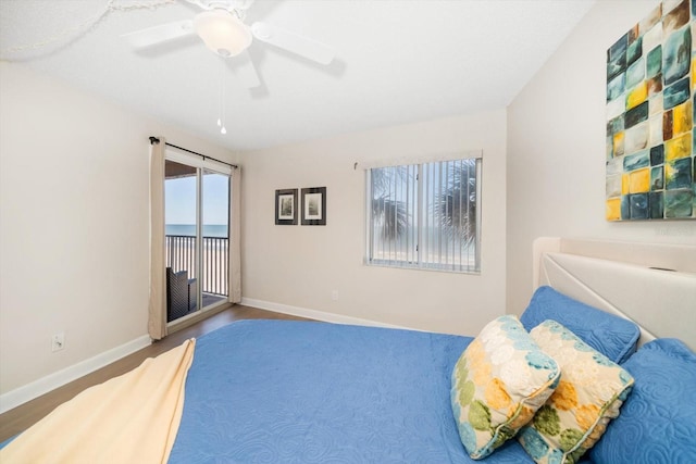 bedroom with hardwood / wood-style flooring and ceiling fan