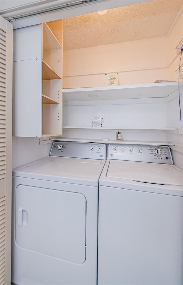 laundry room featuring independent washer and dryer